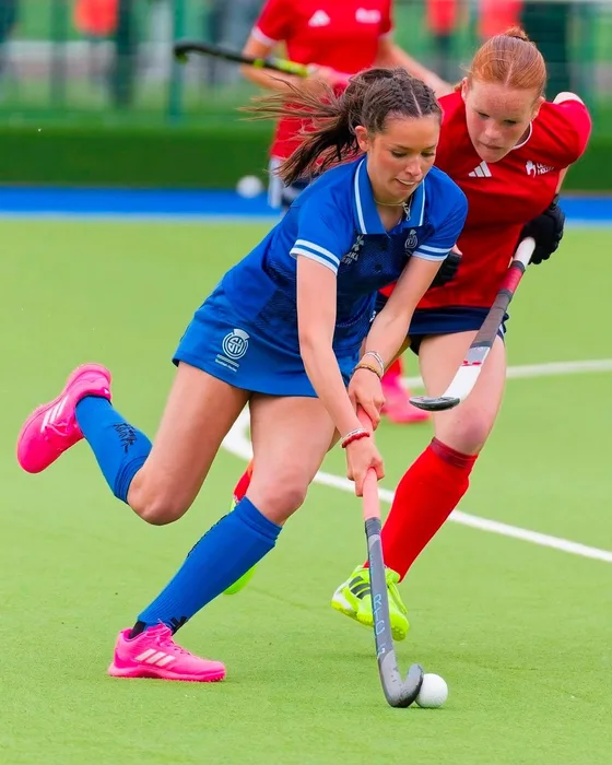 Juliet Brown driving past a defender for Scotland Emerging against Ulster U16s.
