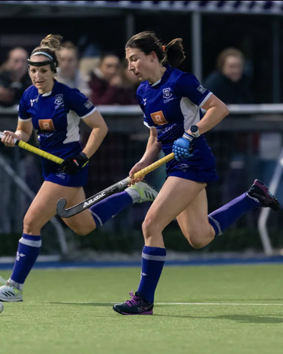 Mckenzie Bell sprinting during a Scotland hockey match.